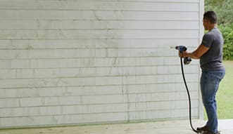 Turbo Jet® HydroX5® cleaning house siding